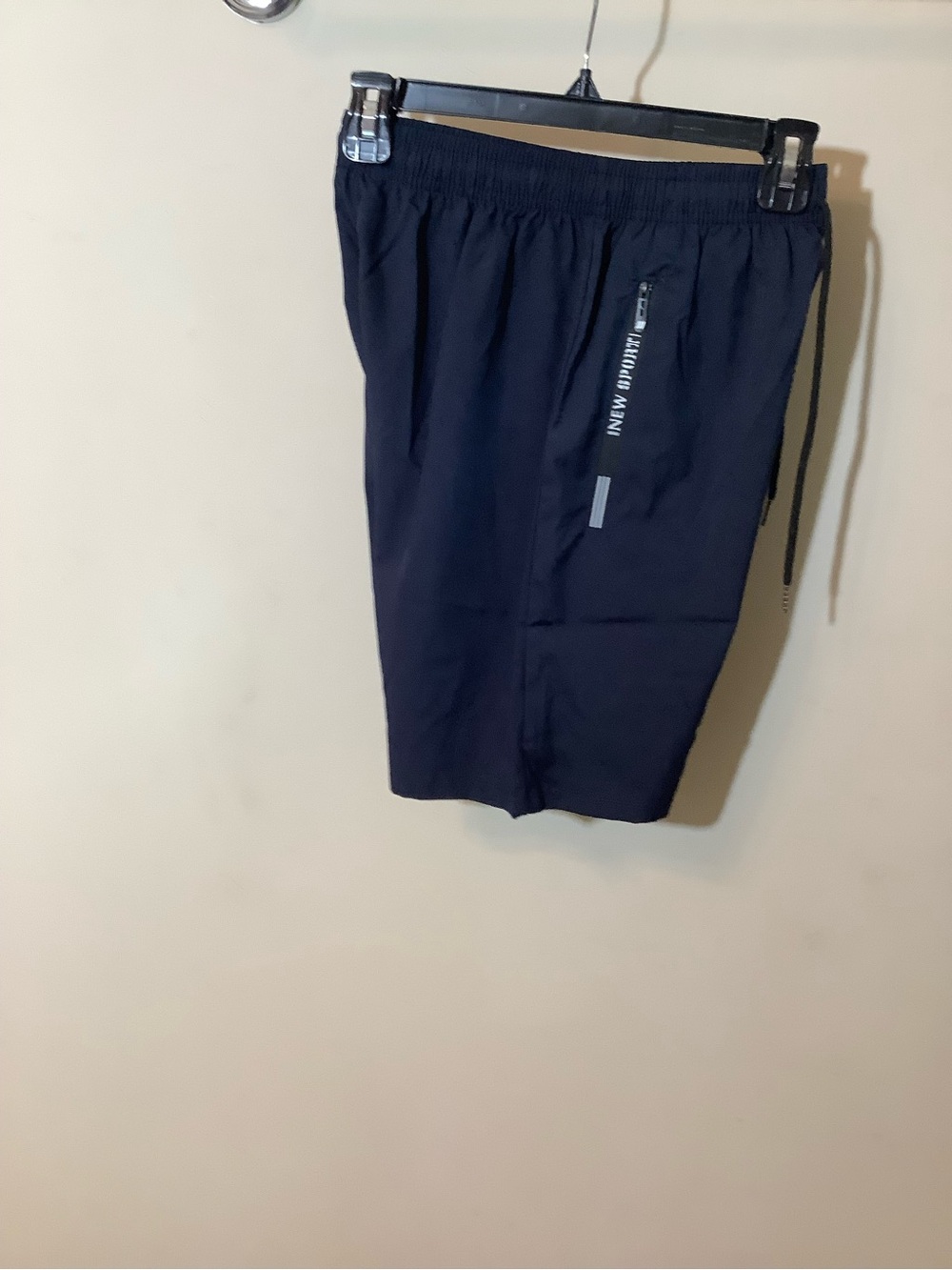 Women’s Navy Athletic Shorts with two front Zip Pockets and Drawcord